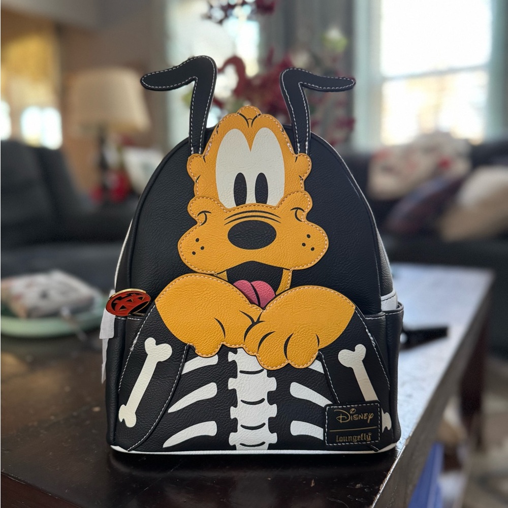 Brand New Halloween Pluto loungefly - glow in the dark